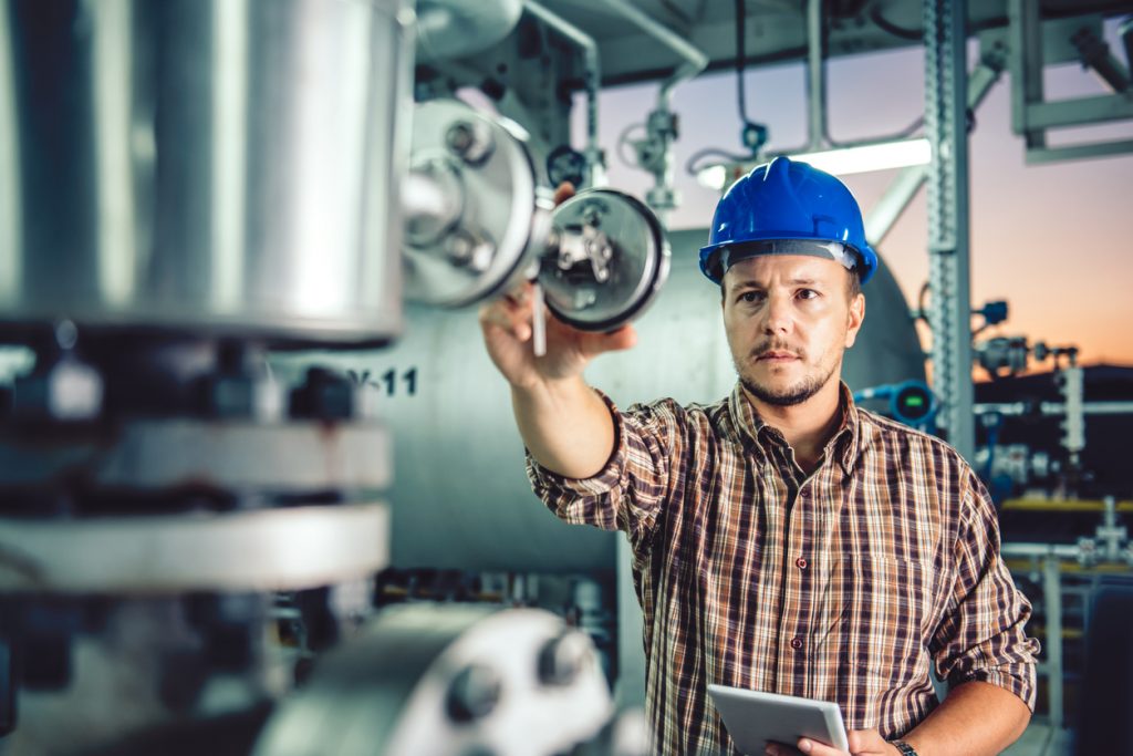 engineer checking on equipment