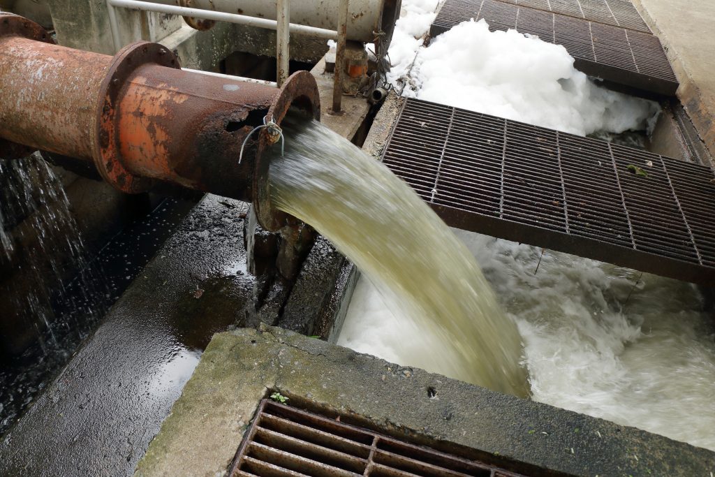 water discharging from pipe