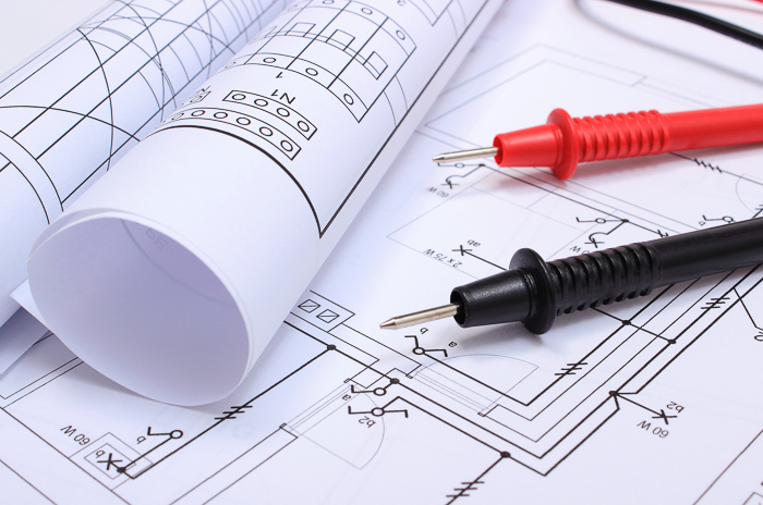 rolled diagram with electrical testers 